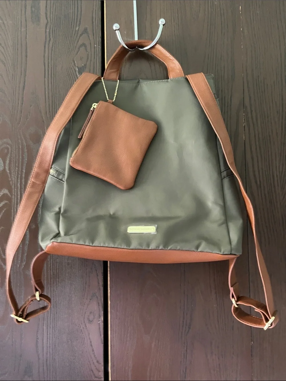 Steve Madden dark green backpack purse with change purse.